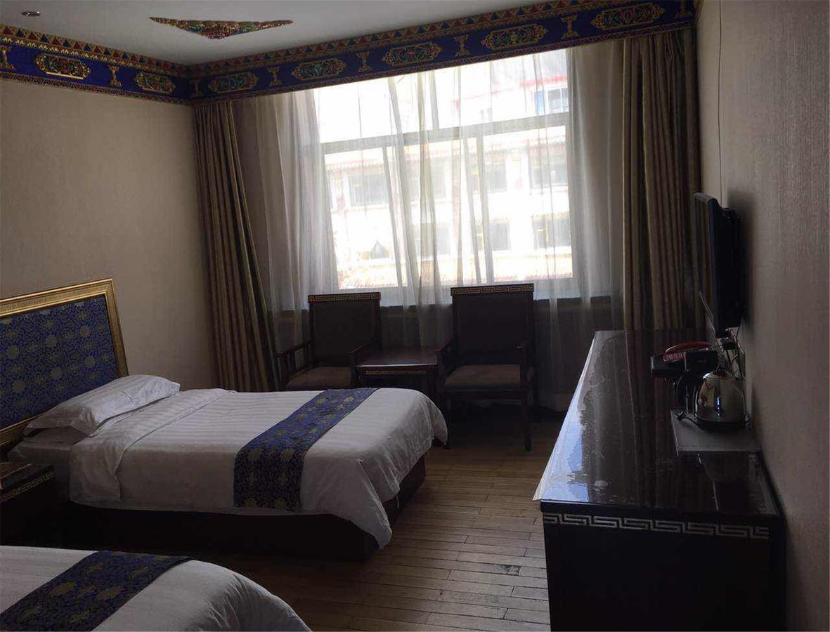 Overseas Tibetan Hotel Сяхе Екстер'єр фото